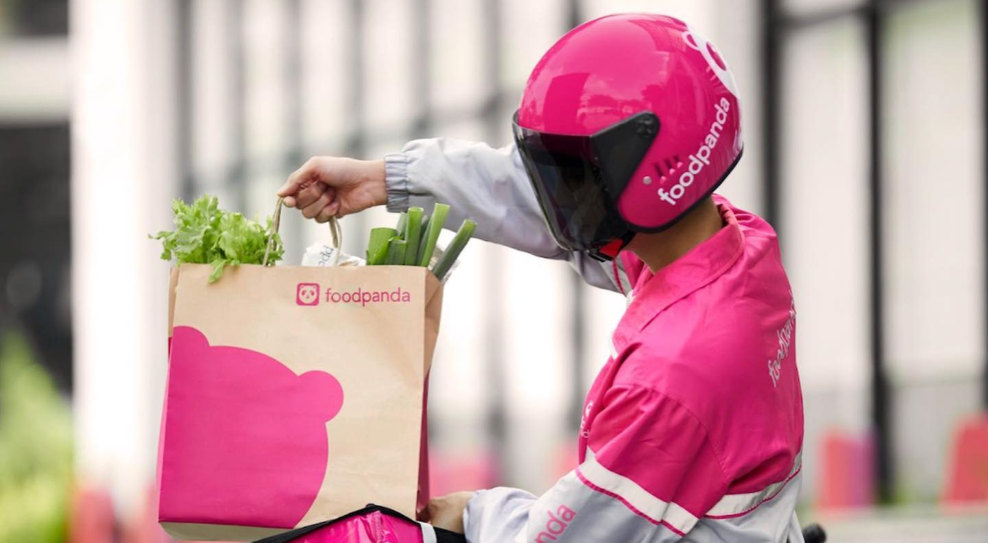 Foodpanda rider holding a bag